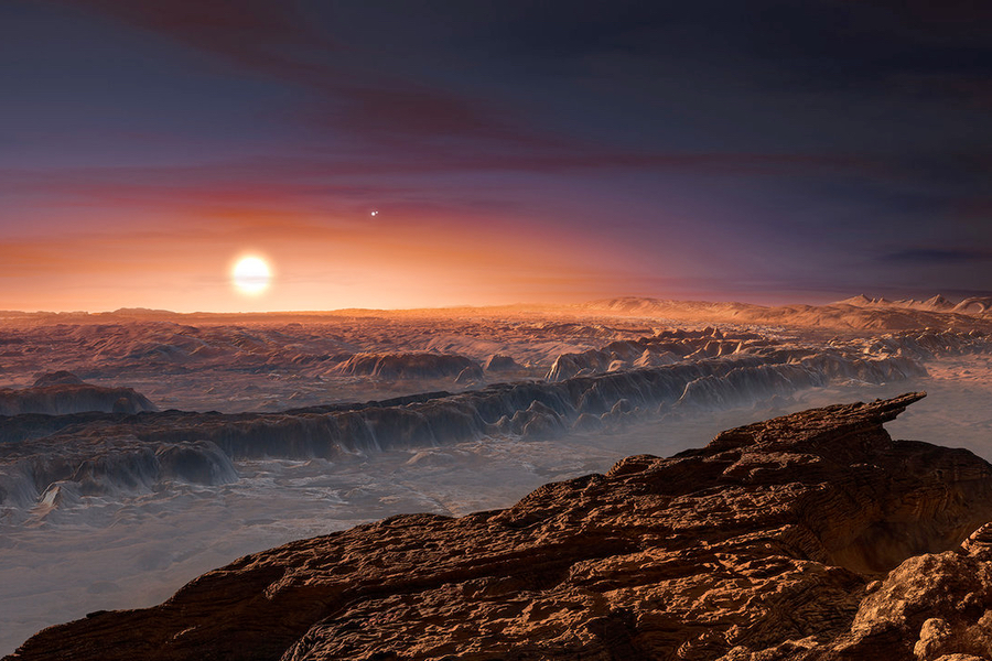 Cette impression d'artiste montre une vue de la surface de la planète Proxima b en orbite autour de l'étoile naine rouge Proxima Centauri. (Crédit: ESO/M. Kornmesser)