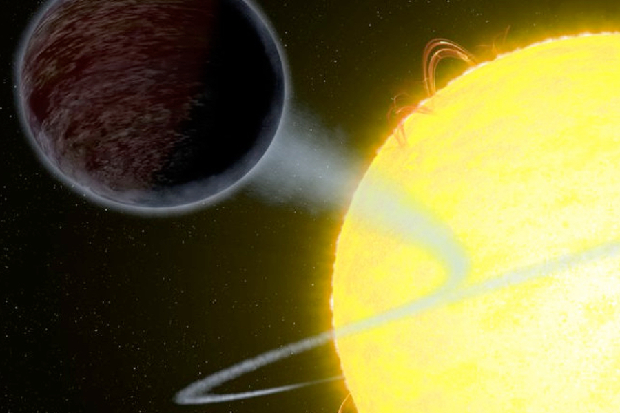 An artist's rendering of the exoplanet WASP-12 b, one of the darkest exoplanets ever observed. (Credit: NASA/ESA/G. Bacon/STScI)