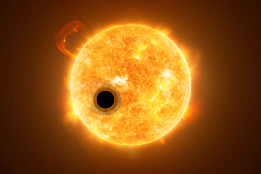Artistic rendition of the exoplanet WASP-107b and its star, WASP-107. Some of the star’s light streams through the exoplanet’s extended gas layer. (Credit: ESA/Hubble/NASA/M. Kornmesser)
