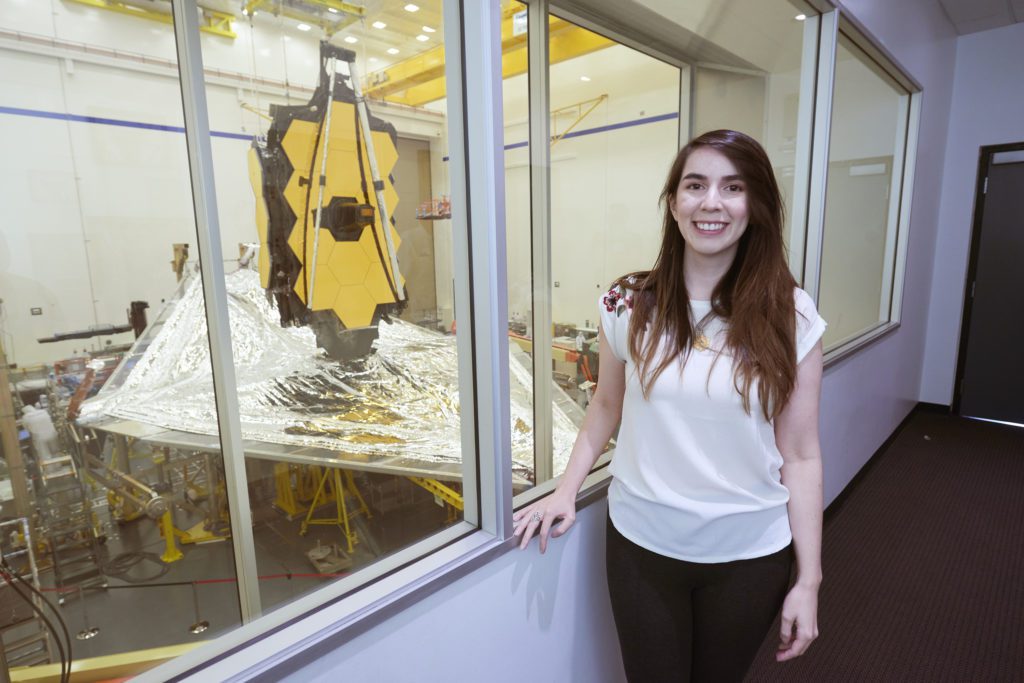 Nathalie Ouellette, Outreach Scientist for the Webb Telescope in Canada, visiting the Webb Telescope at Northrop Grumman facilities in Redondo Beach, California in 2019