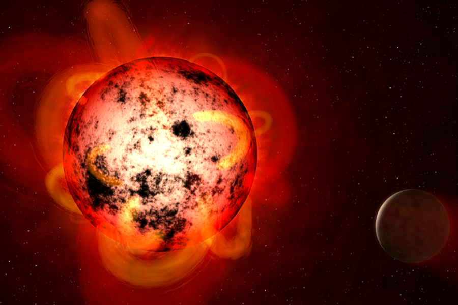 Représentation artistique des taches stellaires et de l'activité stellaire d'une naine rouge. Crédit : NASA