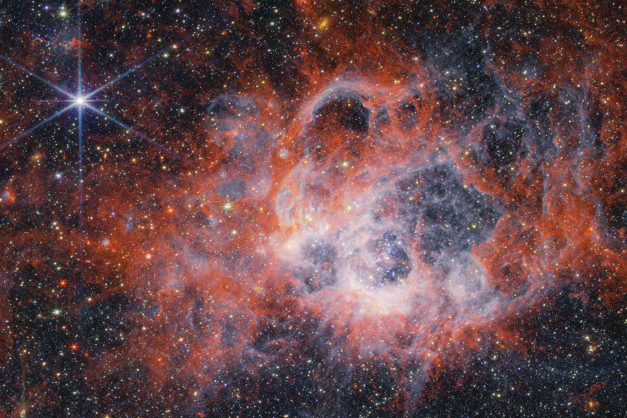 La région de formation d'étoiles NGC 604 vue par l'instrument NIRCam du JWST. (Crédit : NASA/ESA/CSA/STScI)